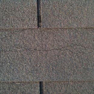 Cracked shingles on roof